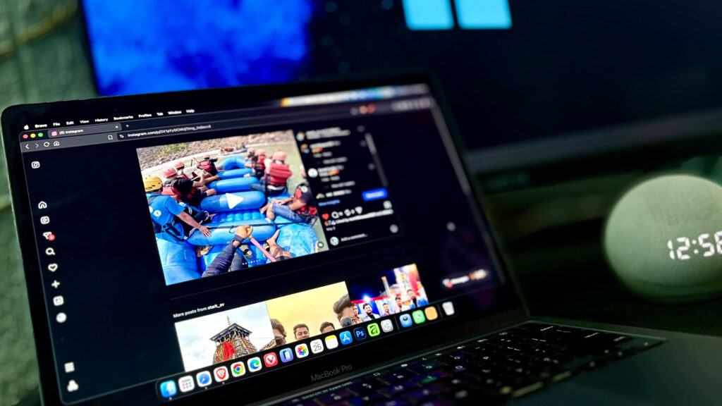 Instagram post from a rafting trip open on a laptop screen