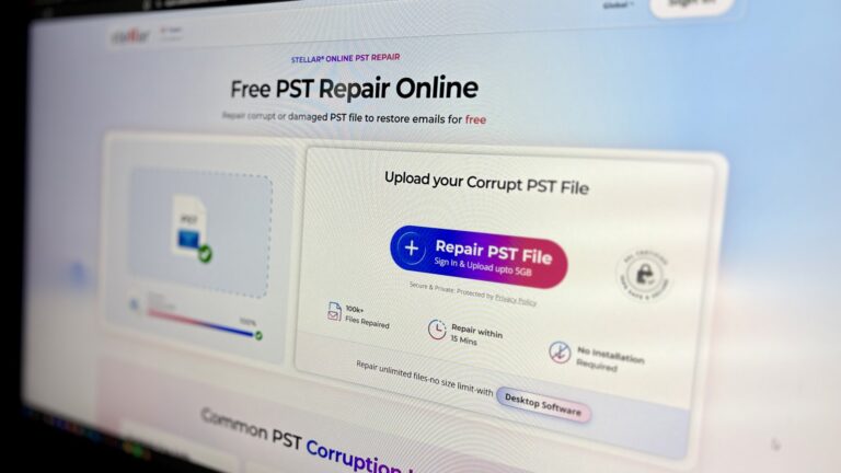 A website displaying a free PST repair service with a prominent blue-to-pink gradient button labeled 'Repair PST File Online'