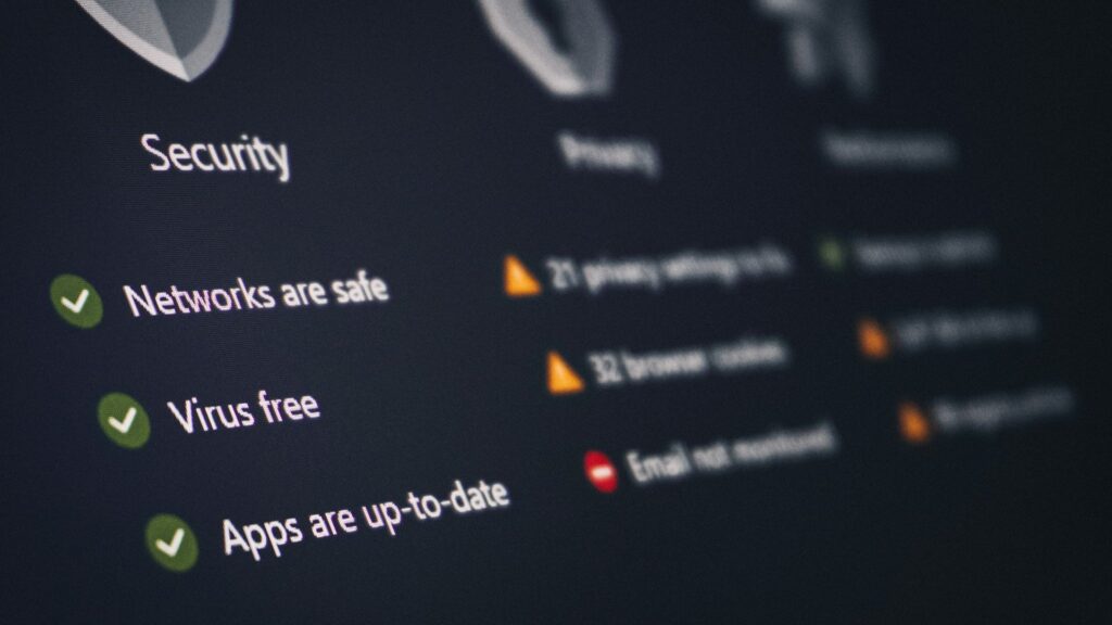 A security status screen displays green checkmarks confirming networks are safe, virus free, and apps are up-to-date